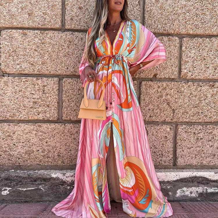 Abito lungo con scollo a V e allacciatura a corsetto dai colori vivaci, firmato Valentina Lo Bello.