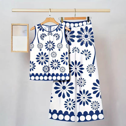 Completo da donna composto da canotta senza maniche, modello irregolare e pantaloni, con stampa alla moda.