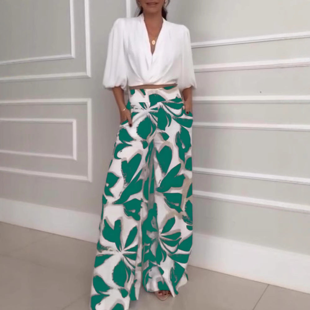 Completo da donna Socialite con pantaloni a gamba larga, maniche a tre quarti, stile casual e alla moda.