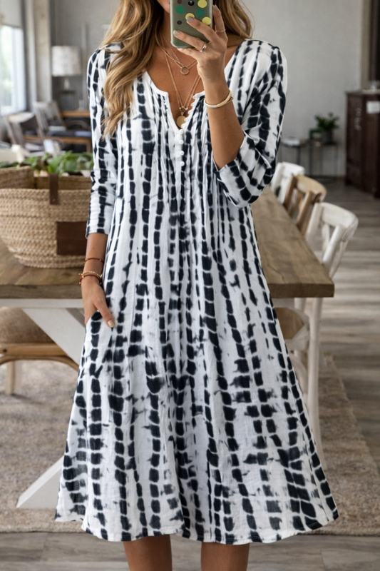 Elegante abito midi a trapezio di Valentina Lo Bello, perfetto per tutti i giorni.